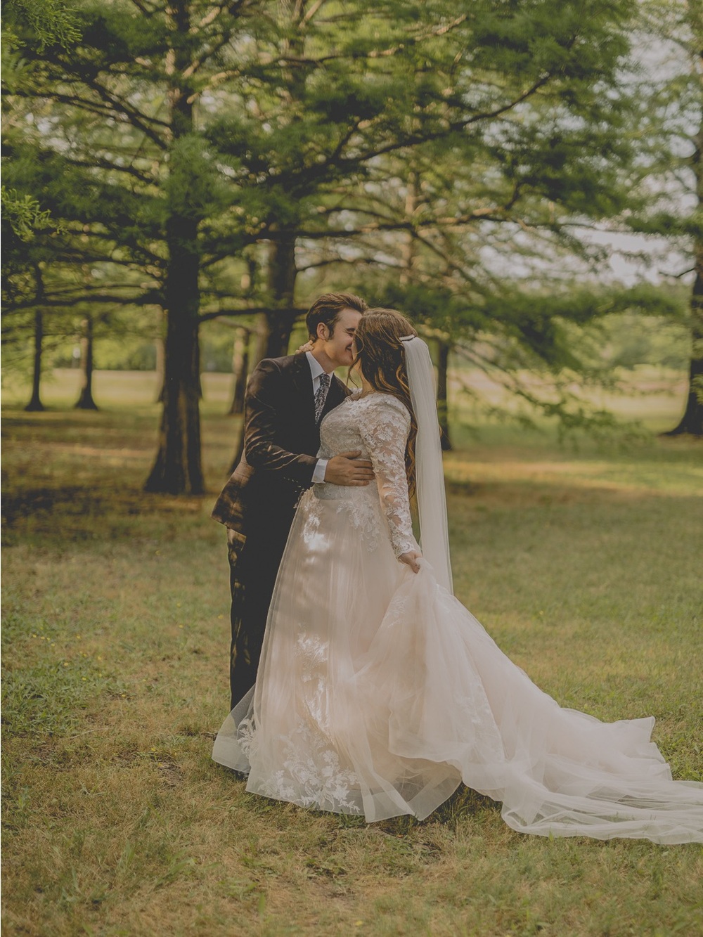 Mon Cheri Ivory Lace Long-Sleeve Wedding Gown